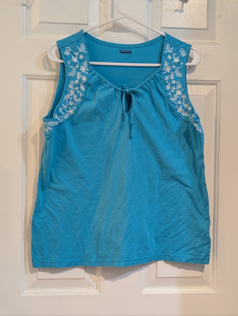 Blue Sleeveless Embroidered Tie-Neck Top